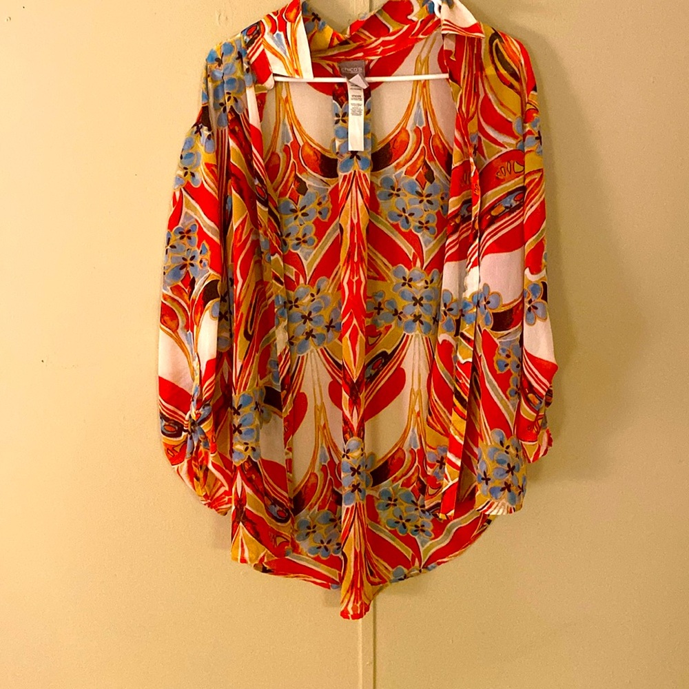 Multi color with flowers and swirls. Never worn